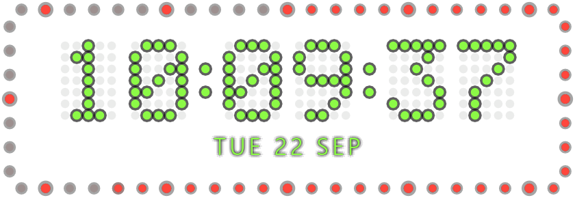 ChronoDesk clock in the Studio colours: green dot-matrix 10:09:37 and TUE 22 SEP, framed by the seconds ring of sixty LEDs that light up red second by second